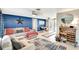 Bright living room features tile floors, comfortable seating, and a bar area at 109 San Rafael Ave, North Port, FL 34287