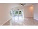 Bright living room with large windows and tile floors at 133 Angol St, Punta Gorda, FL 33983