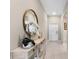 Bright entryway with a console table and mirror at 15410 Miller Creek Dr, Ruskin, FL 33573