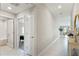 Hallway with access to bathroom and bedroom at 15410 Miller Creek Dr, Ruskin, FL 33573