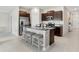 Modern kitchen with stainless steel appliances and island at 15410 Miller Creek Dr, Ruskin, FL 33573