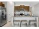 Modern kitchen with stainless steel appliances and island at 15410 Miller Creek Dr, Ruskin, FL 33573
