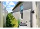 Landscaped side yard with privacy fence and plants at 15410 Miller Creek Dr, Ruskin, FL 33573