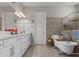 Elegant bathroom with soaking tub, double vanity, and separate shower at 19270 Briarbrook Dr, Tampa, FL 33647