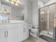 Clean bathroom with a walk-in shower and modern vanity at 19270 Briarbrook Dr, Tampa, FL 33647
