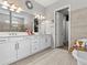 Spacious bathroom with double vanity and a clawfoot tub at 19270 Briarbrook Dr, Tampa, FL 33647