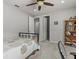 Bedroom with a bed, carpeted floor, and access to other rooms at 19270 Briarbrook Dr, Tampa, FL 33647