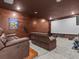Finished basement with a home theater and comfortable seating at 19270 Briarbrook Dr, Tampa, FL 33647