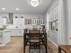 Bright kitchen with white cabinets, granite countertops, and stainless steel appliances at 19270 Briarbrook Dr, Tampa, FL 33647