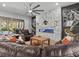 Comfortable living room with sectional sofa and modern fireplace at 19270 Briarbrook Dr, Tampa, FL 33647