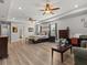 Main bedroom with king bed, sitting area and large windows at 19270 Briarbrook Dr, Tampa, FL 33647