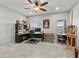 Home office with large desk and comfortable chair at 19270 Briarbrook Dr, Tampa, FL 33647