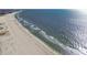 Aerial view of beach with ocean waves at 195 112Th Ave, Treasure Island, FL 33706