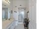 Clean bathroom with double vanity, shower, and toilet at 2231 Utopian E Dr # 321, Clearwater, FL 33763