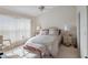 Comfortable bedroom with a queen-sized bed and ample closet space at 2231 Utopian E Dr # 321, Clearwater, FL 33763