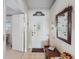 Bright entryway with mirror and console table at 2231 Utopian E Dr # 321, Clearwater, FL 33763