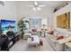 Spacious living room with vaulted ceilings, comfy seating and large TV at 2231 Utopian E Dr # 321, Clearwater, FL 33763