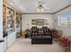 Spacious den with built-in shelving and comfortable seating at 2231 Utopian E Dr # 321, Clearwater, FL 33763