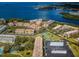 Aerial view of waterfront community with tennis court at 2700 Bayshore Blvd # 4304, Dunedin, FL 34698