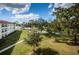 Community boasts a refreshing pool, green lawns, and mature trees at 2700 Bayshore Blvd # 4304, Dunedin, FL 34698