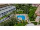 Aerial view of community pool and surrounding buildings at 2700 Bayshore Blvd # 4304, Dunedin, FL 34698