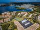 Aerial view of community with tennis courts and waterfront access at 2700 Bayshore Blvd # 4304, Dunedin, FL 34698