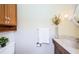 Clean bathroom with updated vanity, tile, and a large medicine cabinet at 2700 Bayshore Blvd # 4304, Dunedin, FL 34698
