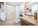 Bathroom with tub shower, vanity, and updated fixtures at 2700 Bayshore Blvd # 4304, Dunedin, FL 34698