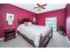 Comfortable bedroom with a double bed and dark wood furniture at 2700 Bayshore Blvd # 4304, Dunedin, FL 34698