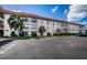 Exterior view of building with parking at 2700 Bayshore Blvd # 4304, Dunedin, FL 34698