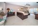 Bright living room with comfy seating and large windows at 2700 Bayshore Blvd # 4304, Dunedin, FL 34698