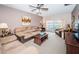 Living room with neutral colored furniture at 2700 Bayshore Blvd # 4304, Dunedin, FL 34698