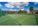 Well-maintained tennis court with surrounding fence at 2700 Bayshore Blvd # 4304, Dunedin, FL 34698