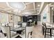 Large clubhouse with comfortable seating and a television at 33975 Astoria Cir, Wesley Chapel, FL 33545