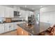 Spacious kitchen with granite countertops, stainless steel appliances, and ample storage space at 33975 Astoria Cir, Wesley Chapel, FL 33545