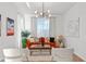 Stylish living room with modern furniture, bright natural light, and elegant décor at 33975 Astoria Cir, Wesley Chapel, FL 33545