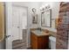 Clean bathroom with shower/tub combo and vanity at 7075 Lafayette N, Pinellas Park, FL 33781