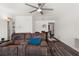 Living room with brown reclining sofas and ceiling fan at 7075 Lafayette N, Pinellas Park, FL 33781