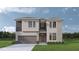 Two-story home with modern facade and attached garage at 804 W Peninsular St, Tampa, FL 33603
