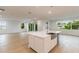 Modern kitchen with stainless steel sink on the large island and lots of natural light at 804 W Peninsular St, Tampa, FL 33603