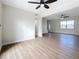 Bright and airy living room with hardwood floors and ceiling fan at 8718 94Th St, Seminole, FL 33777