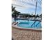 Refreshing community swimming pool with ample lounge chairs at 919 50Th W Ave, Bradenton, FL 34207