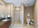 Bathroom with a large walk-in shower and granite vanity at 175 1St S St # 806, St Petersburg, FL 33701