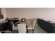 Dining area with a glass table and seating for four at 17920 Gulf Blvd # 1508, Redington Shores, FL 33708