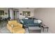 Bright living room featuring comfortable seating and dining area at 17920 Gulf Blvd # 1508, Redington Shores, FL 33708