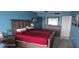 Main bedroom with king bed and dresser at 17920 Gulf Blvd # 1508, Redington Shores, FL 33708