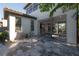 Patio with seating area and view of screened enclosure at 19554 Roseate Dr, Lutz, FL 33558