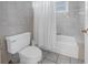Small bathroom with shower/tub combo and toilet at 30 Dolphin Dr, Treasure Island, FL 33706