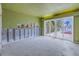 Bedroom with water view and sliding doors leading to patio at 30 Dolphin Dr, Treasure Island, FL 33706