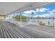 Deck with water views and access from multiple rooms at 30 Dolphin Dr, Treasure Island, FL 33706